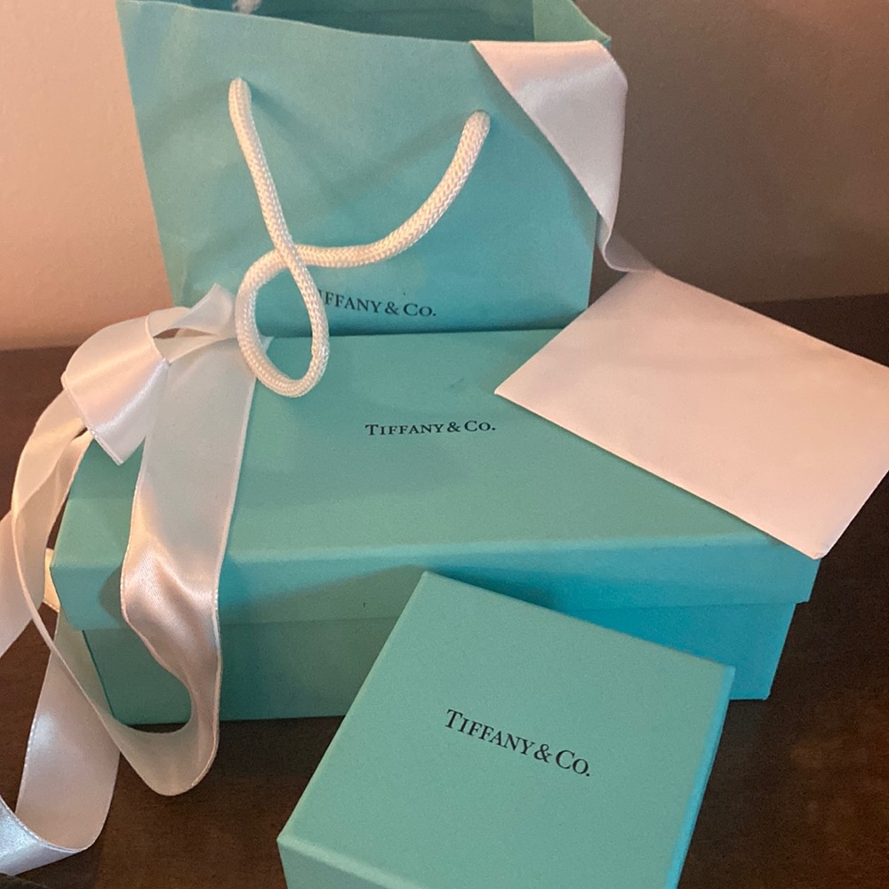 Tiffany bag, sunglasses box, ring box, ribbons and envelope
